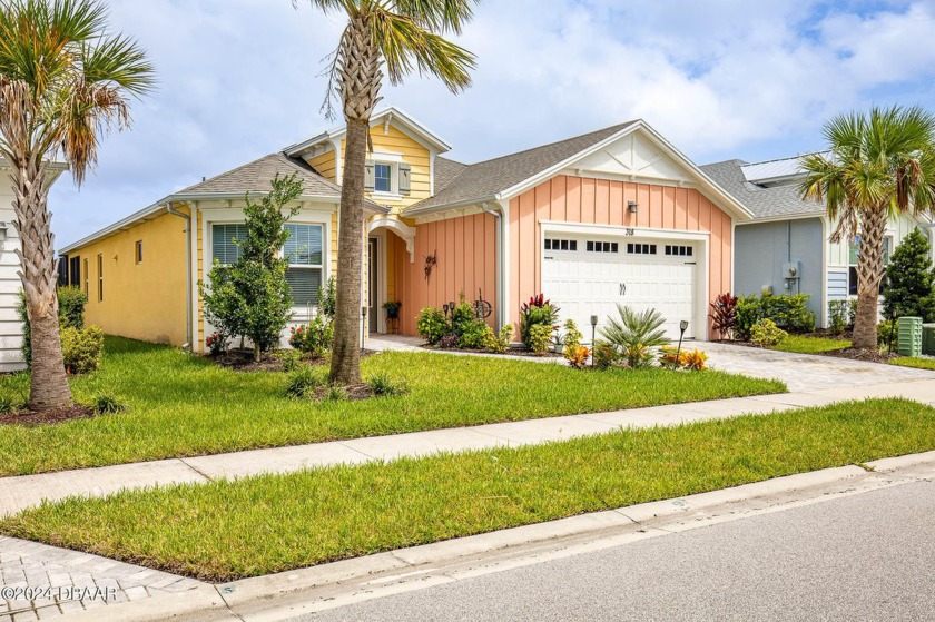 Welcome to a stunning LONG PONDVIEW oasis in this BREEZE BAY - Beach Home for sale in Daytona Beach, Florida on Beachhouse.com