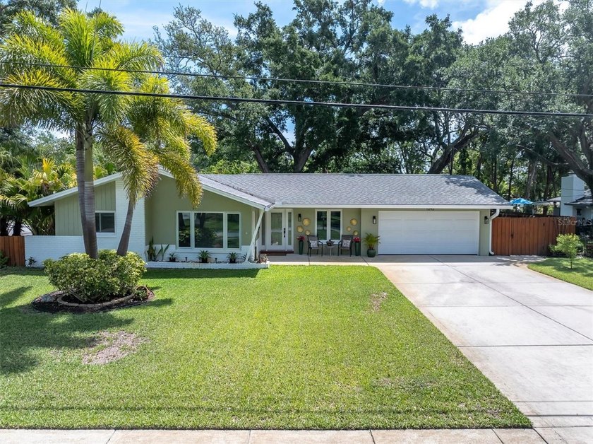 This beautifully maintained 4 Bed/3 Bath+Office mid-century - Beach Home for sale in Clearwater, Florida on Beachhouse.com