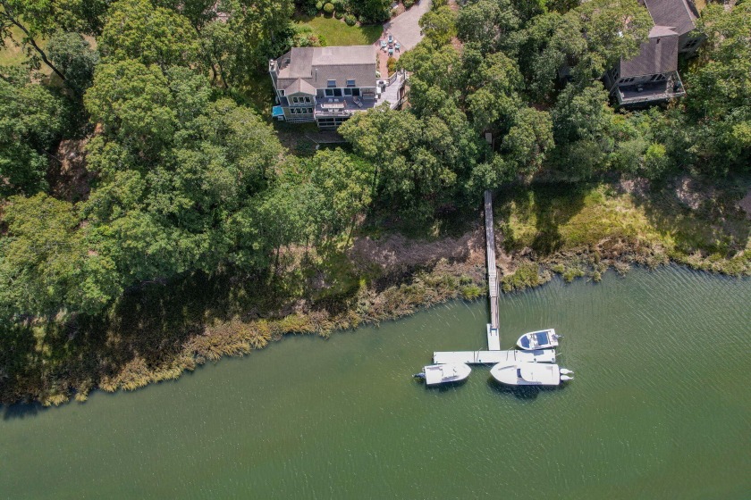 Set on the serene banks of the Namequoit River with 235' of - Beach Home for sale in Orleans, Massachusetts on Beachhouse.com