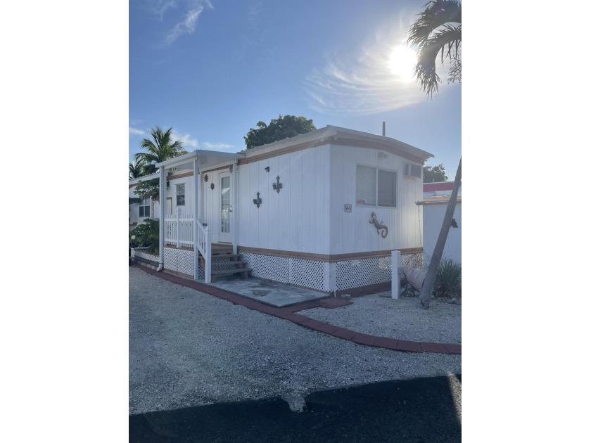 Beautifully updated 2/2 with covered porch (60x12).Extra storage - Beach Home for sale in Key Largo, Florida on Beachhouse.com