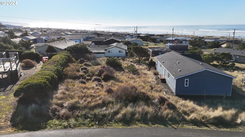 Build your ideal coastal retreat on this flat lot spanning .18 - Beach Lot for sale in Waldport, Oregon on Beachhouse.com