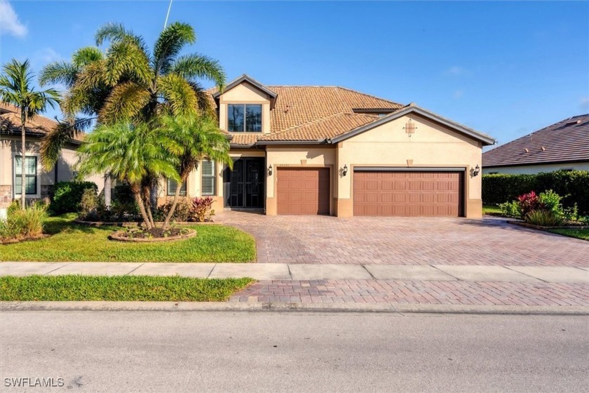 EXQUISITE LAKE FRONT STONEWATER FLOOR PLAN HOME WITH SECOND - Beach Home for sale in Estero, Florida on Beachhouse.com