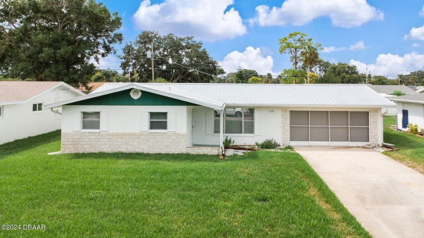 Situated in a popular and quiet neighborhood sits this adorable - Beach Home for sale in Daytona Beach, Florida on Beachhouse.com