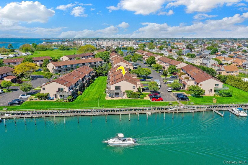 Welcome to waterfront paradise at the desirable Anchorage with - Beach Home for sale in Freeport, New York on Beachhouse.com