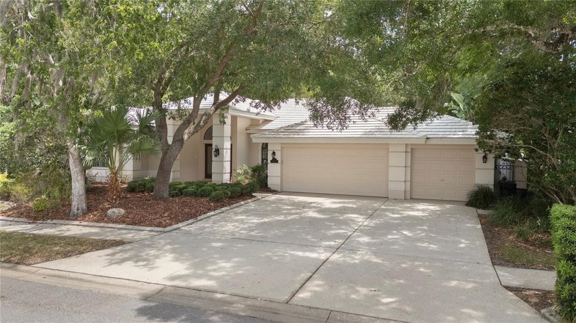 Welcome to an exceptional residence at 50 Kelleys Trail, nestled - Beach Home for sale in Oldsmar, Florida on Beachhouse.com