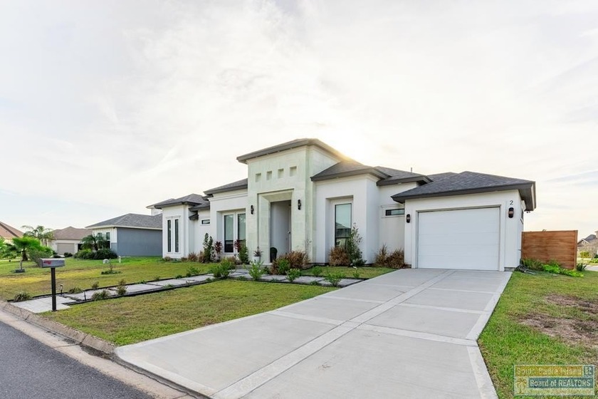 Stunning modern home built in 2022, located in the SPI golf - Beach Home for sale in Laguna Vista, Texas on Beachhouse.com