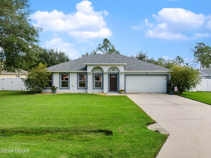 Welcome to 254 Bird of Paradise, a beautifully updated 1,954 sq - Beach Home for sale in Palm Coast, Florida on Beachhouse.com