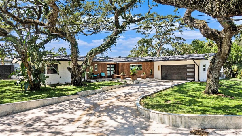 High and dry, this fully updated 4-bedroom, 3.5-bath mid-century - Beach Home for sale in St. Petersburg, Florida on Beachhouse.com
