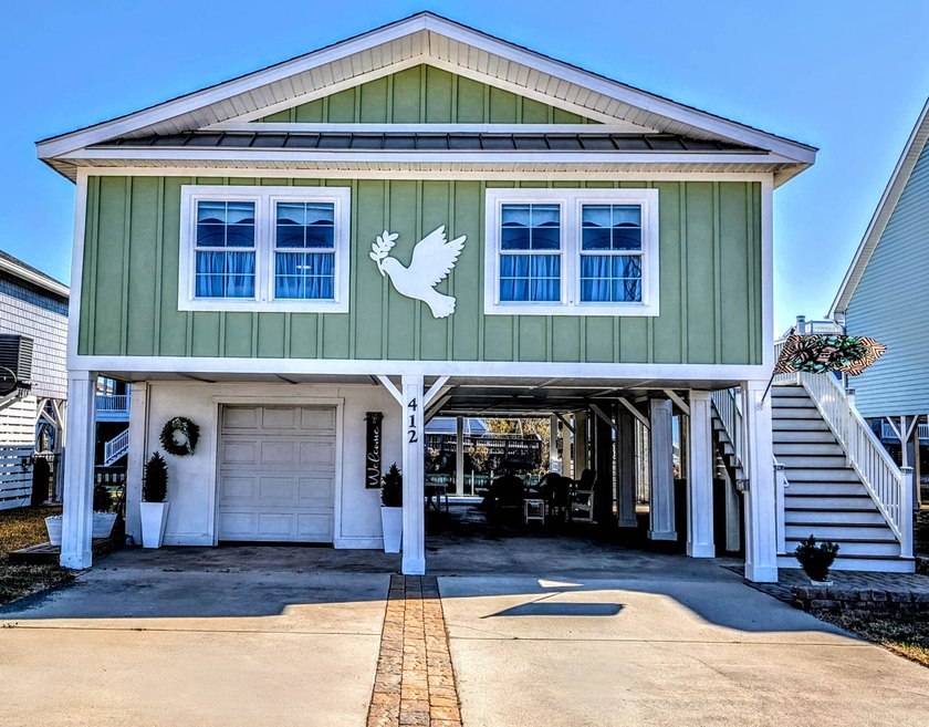 In the quiet, nostalgic heart of Cherry Grove, where the salt - Beach Home for sale in North Myrtle Beach, South Carolina on Beachhouse.com