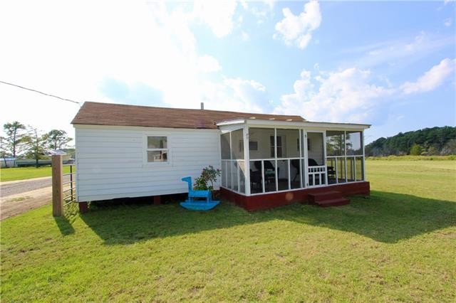 Embrace waterfront charm with this fixer-upper cottage offering - Beach Home for sale in Moon, Virginia on Beachhouse.com