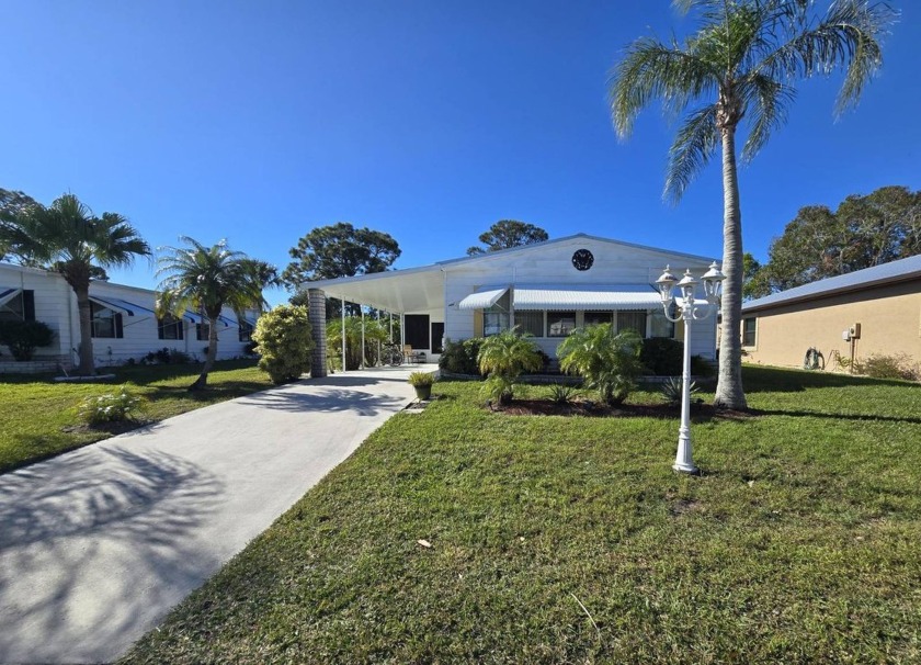 Discover this fully furnished home on the 8th Green, offering - Beach Home for sale in Fort Pierce, Florida on Beachhouse.com