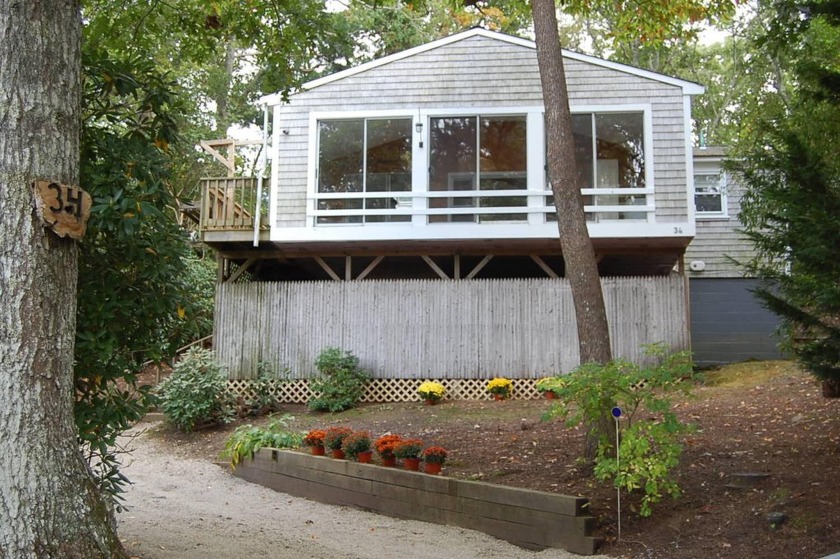 This delightful 3-bedroom year-round, renovated cottage retreat - Beach Home for sale in Mashpee, Massachusetts on Beachhouse.com