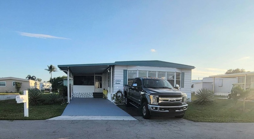 Step into this completely transformed turn-key mobile home - Beach Home for sale in West Palm Beach, Florida on Beachhouse.com