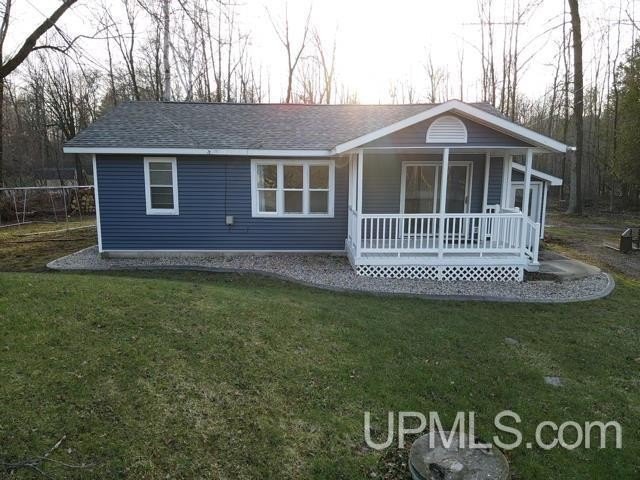 Conveniently located just outside the city limits, this - Beach Home for sale in Menominee, Michigan on Beachhouse.com