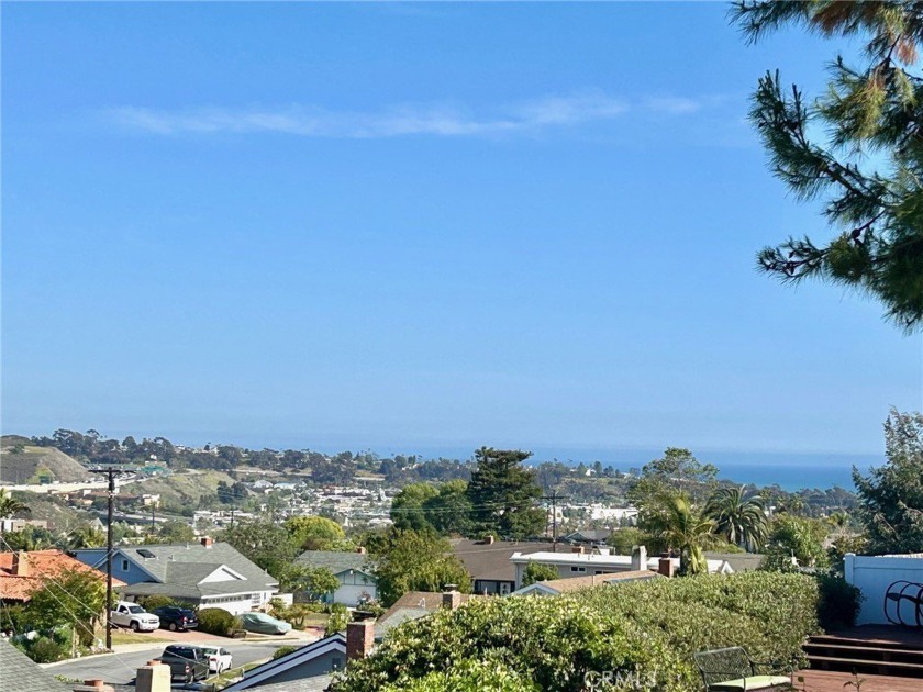 Here is a home that has it ALL!  Ocean views, pool, 4 bedrooms + - Beach Home for sale in Dana Point, California on Beachhouse.com