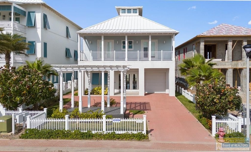 Unparalleled waterfront elegance at 310 Shore Dr., South Padre - Beach Home for sale in South Padre Island, Texas on Beachhouse.com