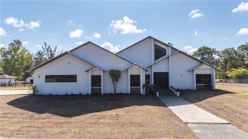 This custom home is situated on 10.49 acres, on a fresh water - Beach Home for sale in Cape Coral, Florida on Beachhouse.com