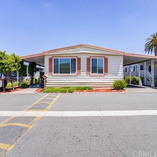 This adorable home is just minutes away from the beach, located - Beach Home for sale in Huntington Beach, California on Beachhouse.com