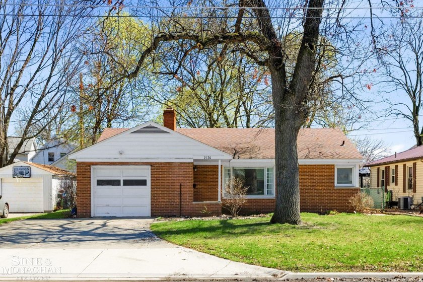 Charming and full of character, 3126 Gratiot Ave is an adorable - Beach Home for sale in Port Huron, Michigan on Beachhouse.com