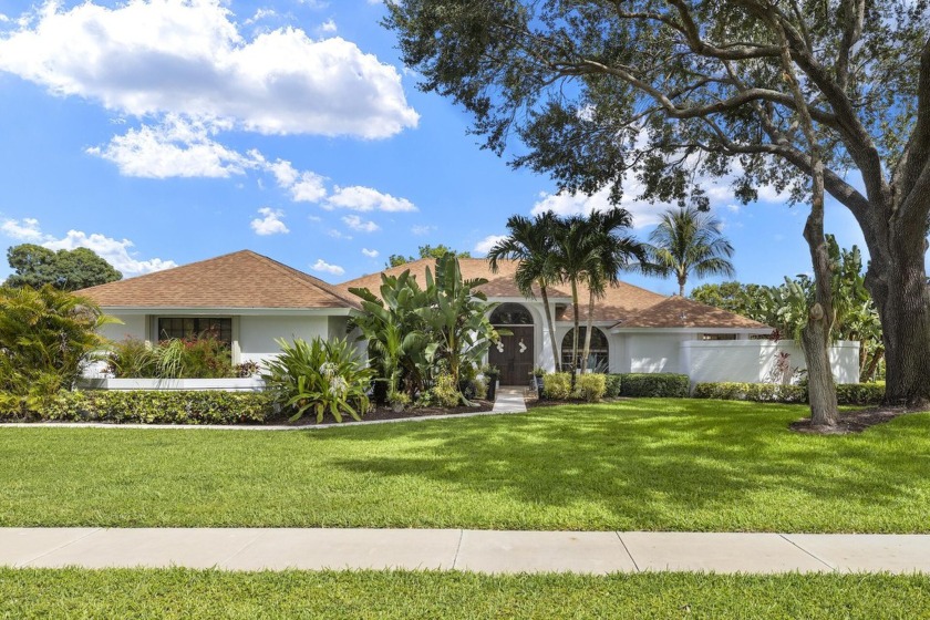 Immaculately maintained custom home on 1/2 acre in Meadowood - Beach Home for sale in Wellington, Florida on Beachhouse.com