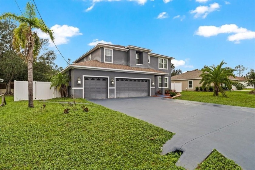 Welcome to this exceptional 4-bedroom, 2.5-bathroom POOL home - Beach Home for sale in Palm Coast, Florida on Beachhouse.com