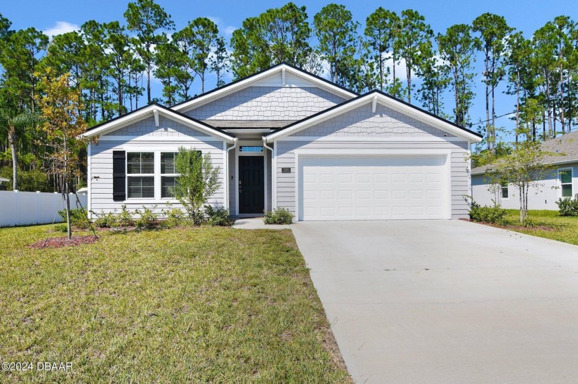 **NEWLY BUILT 2023 HOME** just minutes from I-95 and Flagler - Beach Home for sale in Palm Coast, Florida on Beachhouse.com