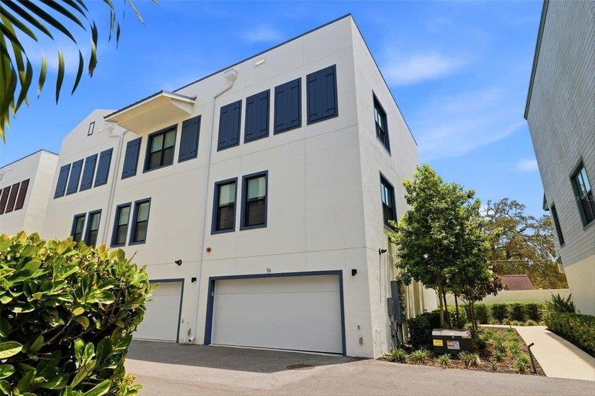 Natural light moves with intention through this three-story - Beach Townhome/Townhouse for sale in Dunedin, Florida on Beachhouse.com