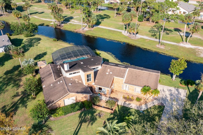 Welcome to this stunning, high-and-dry, custom-built brick home - Beach Home for sale in Daytona Beach, Florida on Beachhouse.com