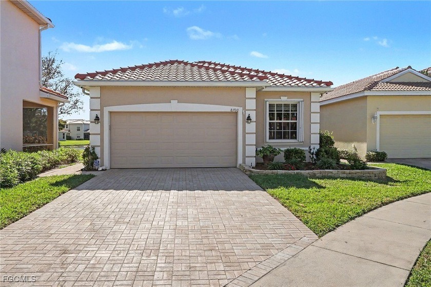 Get ready to fall in love - this home in Laguna Lakes isn't just - Beach Home for sale in Fort Myers, Florida on Beachhouse.com