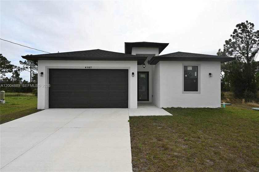 Discover this brand-new home in the rapidly growing community of - Beach Home for sale in Lehigh Acres, Florida on Beachhouse.com