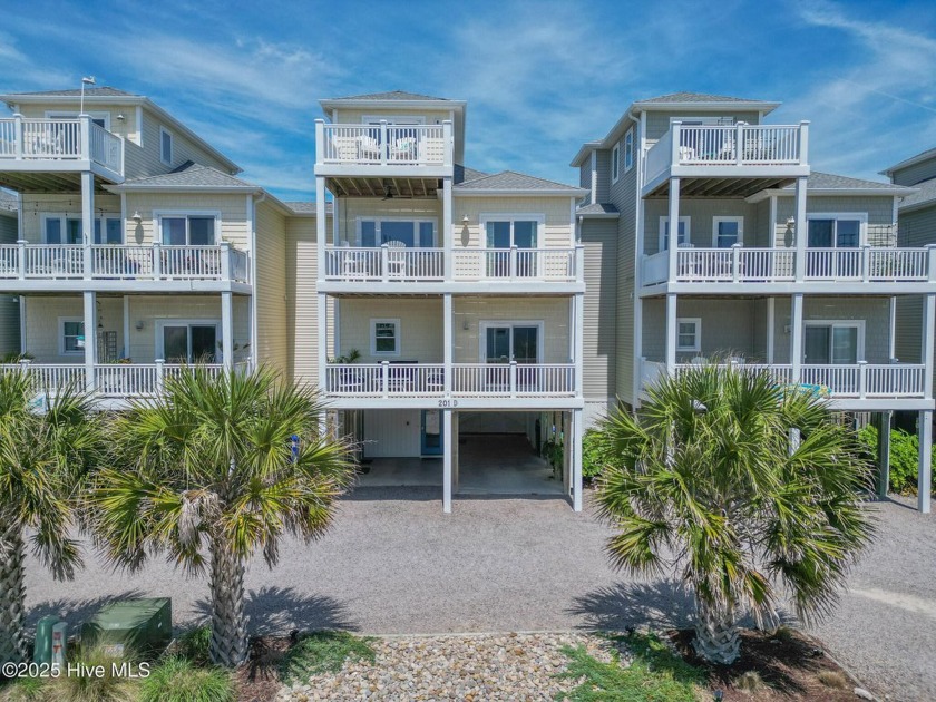 Experience coastal elegance at its finest with this stunning - Beach Townhome/Townhouse for sale in Surf City, North Carolina on Beachhouse.com
