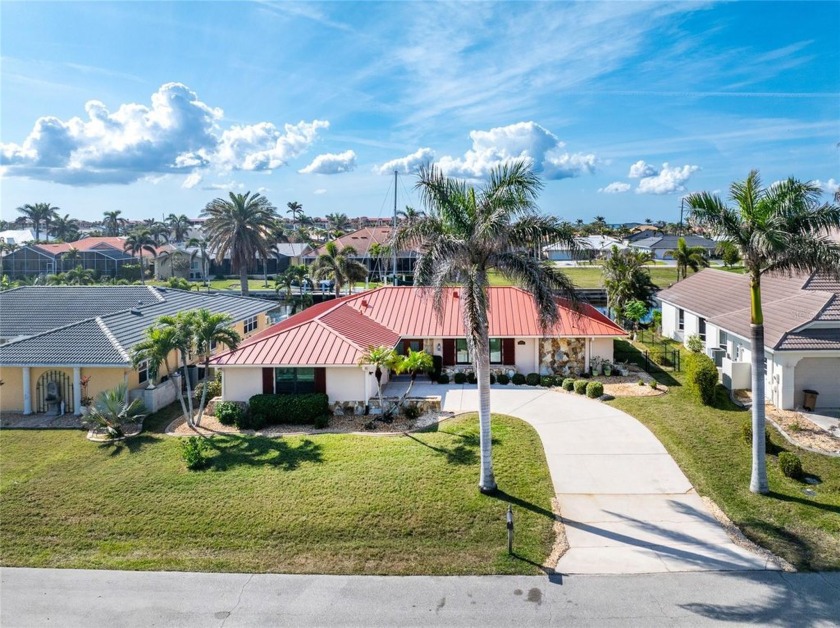 Impressive WATERFRONT 3 Bedroom, 2 Bathroom home with attached 2 - Beach Home for sale in Punta Gorda, Florida on Beachhouse.com