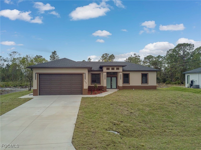 Beautiful New Construction 3 Bedroom + Den, 2 Bath Home in - Beach Home for sale in Lehigh Acres, Florida on Beachhouse.com