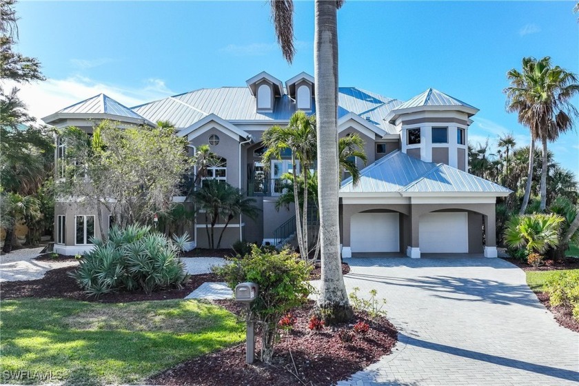 Discover waterfront paradise in this exquisite custom-built home - Beach Home for sale in Fort Myers, Florida on Beachhouse.com