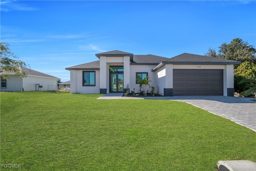 Welcome to this beautiful new construction home in the heart of - Beach Home for sale in Cape Coral, Florida on Beachhouse.com