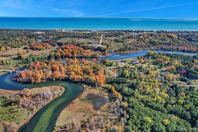 21+ acres of nicely wooded waterfront. Accessible by a paved - Beach Acreage for sale in Oscoda, Michigan on Beachhouse.com
