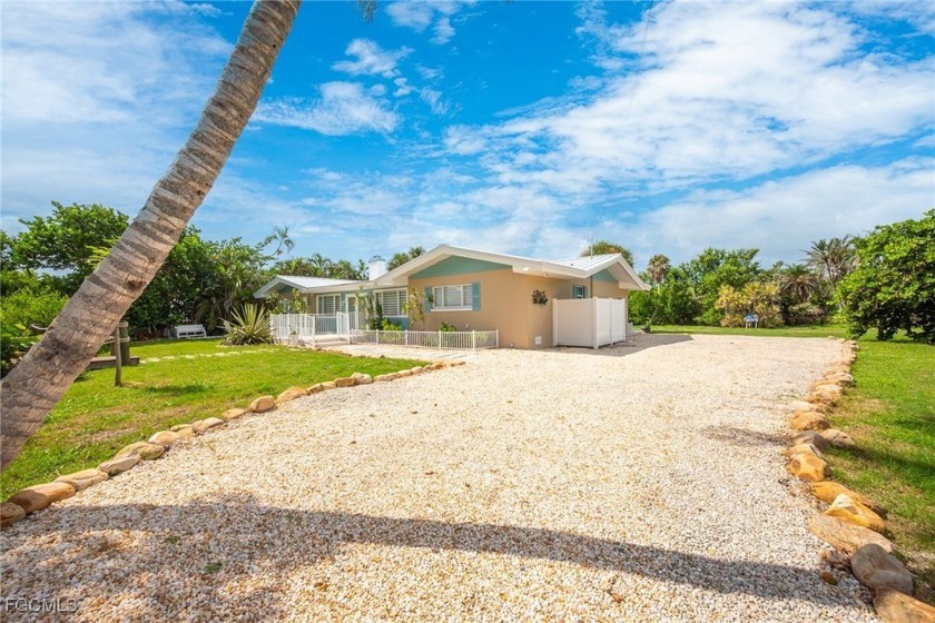 Welcome to this beautifully remodeled coastal home, ideally - Beach Home for sale in Sanibel, Florida on Beachhouse.com