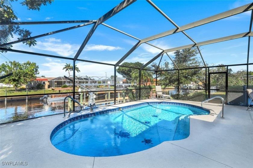 Stunning Waterfront Pool Home with Dock  Lift, Minutes to the - Beach Home for sale in Cape Coral, Florida on Beachhouse.com