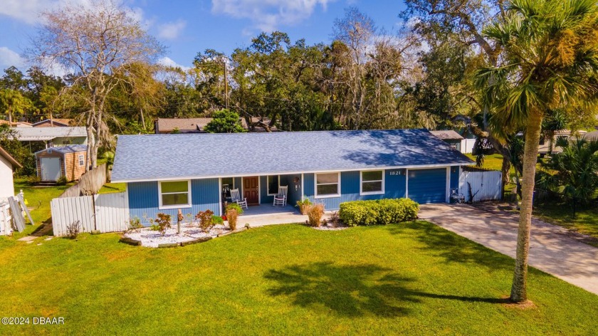 Welcome to this cozy 3-bedroom, 2-bath home nestled in the heart - Beach Home for sale in Edgewater, Florida on Beachhouse.com