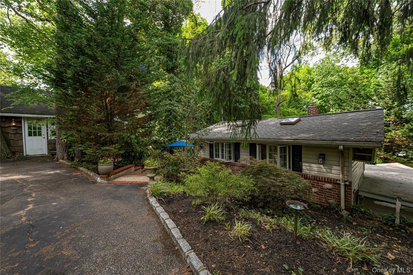 Charming circa 1918 ranch nestled on a .16-acre property in - Beach Home for sale in Northport, New York on Beachhouse.com