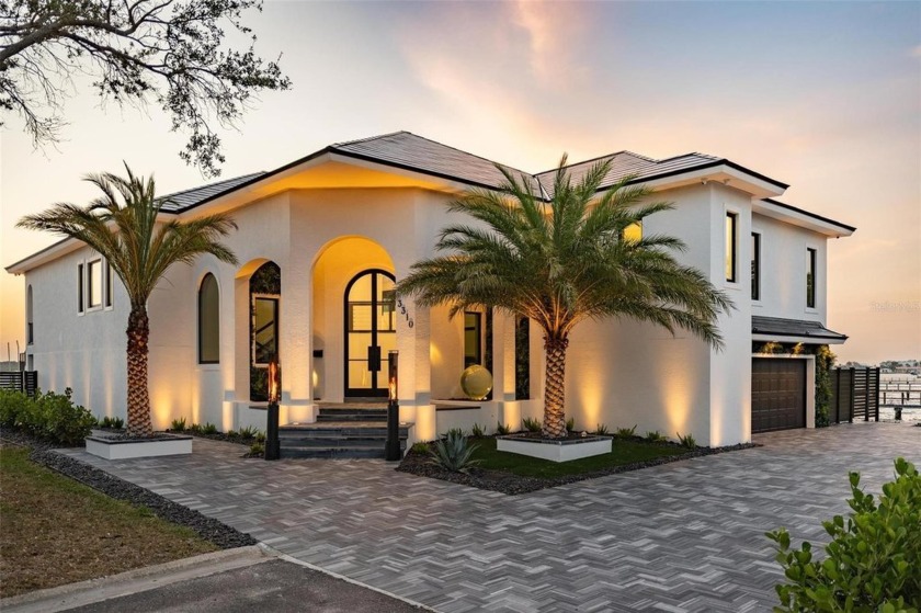 Set on a corner lot with over 200 feet of waterfront, this - Beach Home for sale in St. Petersburg, Florida on Beachhouse.com