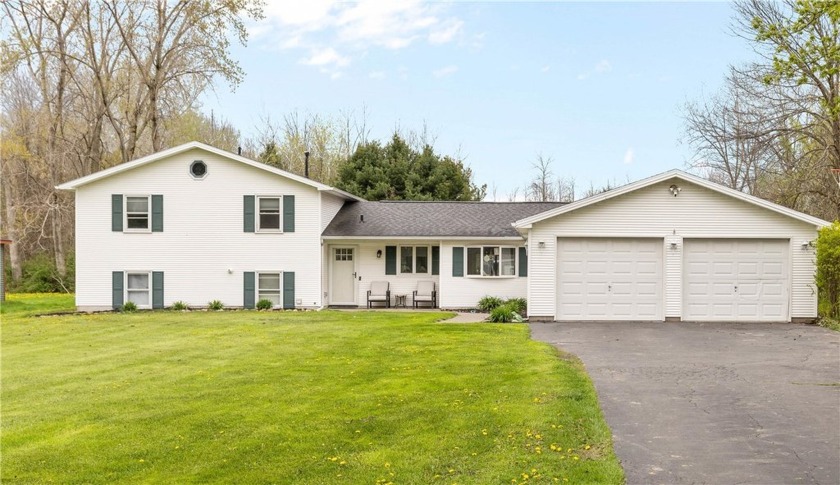Welcome to this beautifully maintained 4-bedroom split level - Beach Home for sale in Ontario, New York on Beachhouse.com