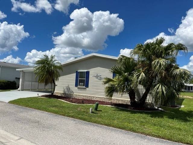 This stunning 2-bedroom, 2-bathroom plus den lakefront home is - Beach Home for sale in Punta Gorda, Florida on Beachhouse.com