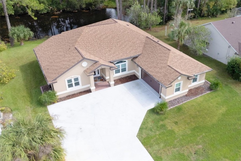 Picture yourself in a newly renovated home situated on 80 feet - Beach Home for sale in Palm Coast, Florida on Beachhouse.com