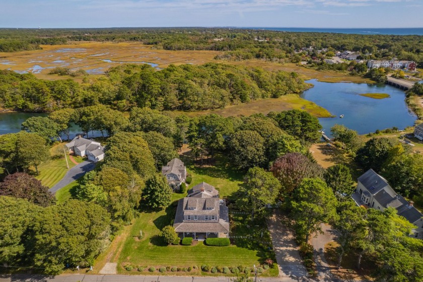 Experience the charm and tranquility of life on the Herring - Beach Home for sale in West Harwich, Massachusetts on Beachhouse.com