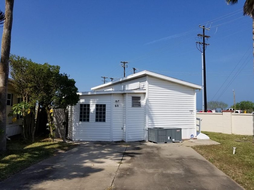 Recently remodeled & fully furnished cottage home with a deck at - Beach Home for sale in Port Isabel, Texas on Beachhouse.com