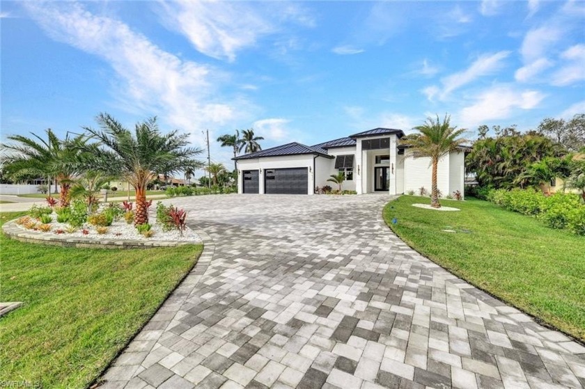 New construction gulf access home featuring 4 bedrooms, 4 - Beach Home for sale in Cape Coral, Florida on Beachhouse.com