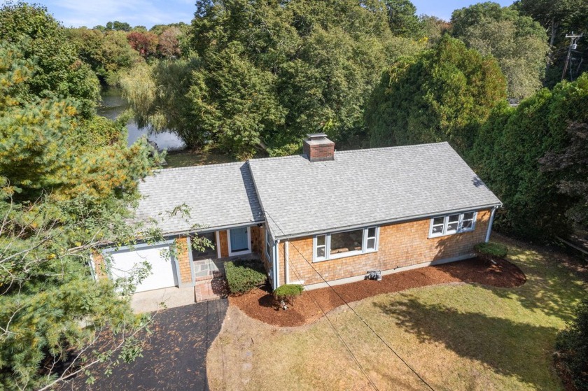 YOUR LAKE ESCAPE AWAITS! This stunning WATERFRONT 2-bedroom - Beach Home for sale in Barnstable, Massachusetts on Beachhouse.com