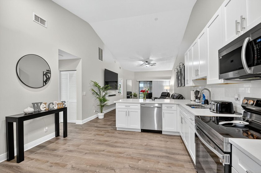 Waterfront single-story villa with garage and new community - Beach Townhome/Townhouse for sale in Lake Worth, Florida on Beachhouse.com