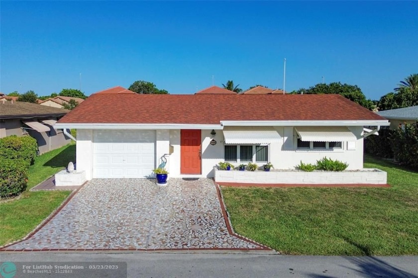 Discover this turnkey, beautiful waterfront, single-family home - Beach Home for sale in Tamarac, Florida on Beachhouse.com